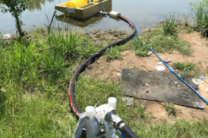 Drum skimmer with pump