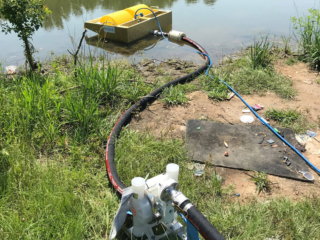 Drum skimmer with pump