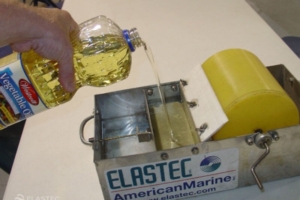 Adding oil in skimmer test kit