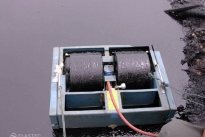 MiniMax skimming oil on water
