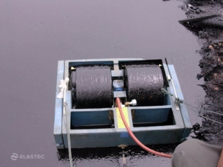 MiniMax skimming oil on water