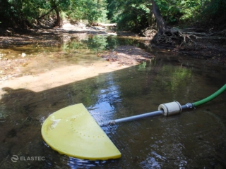 Suction skimmer floating in water