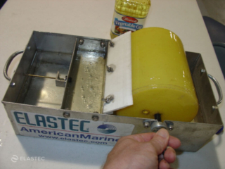 Turning oil drum on skimmer test kit