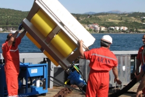 Magnum 100 skimmer on crane