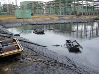 Oil skimmers in industrial pit