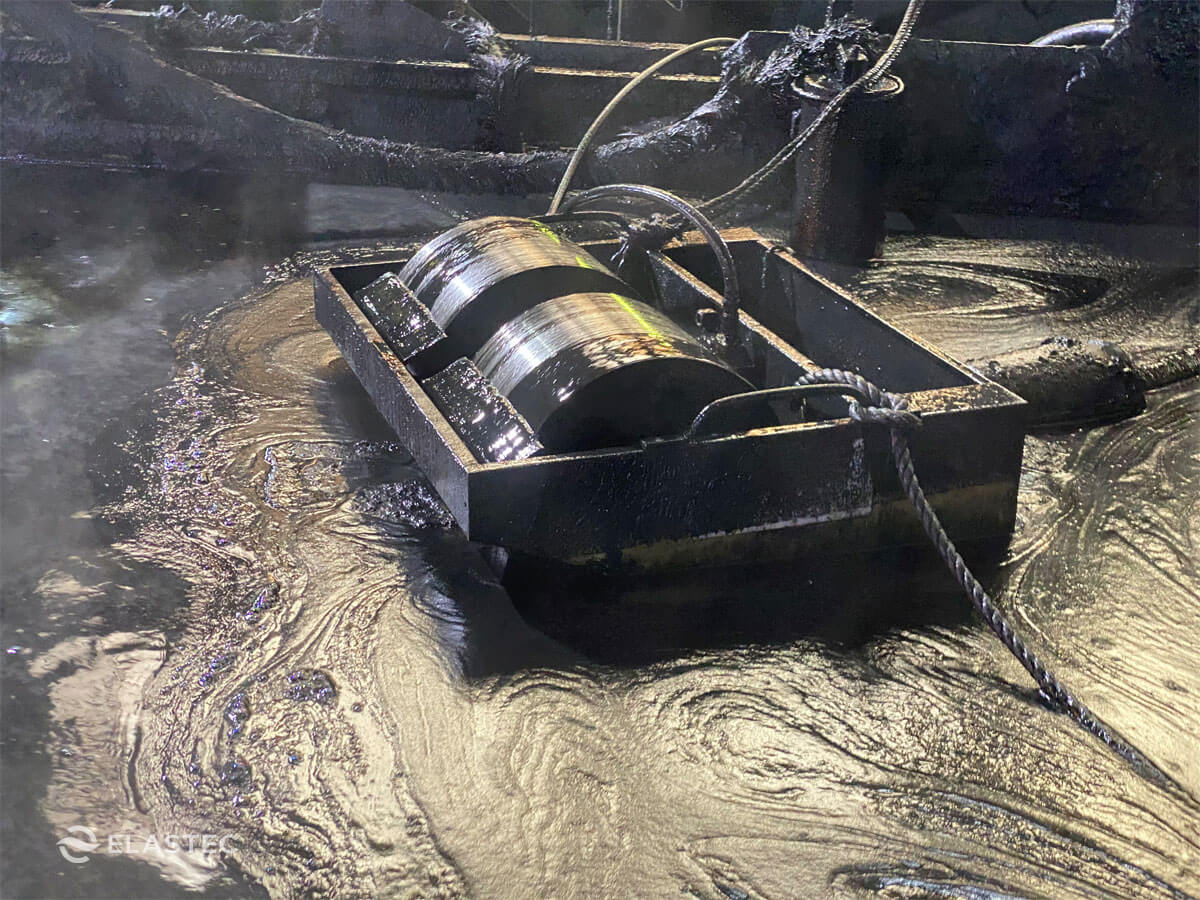 Oil skimmers in industrial pit