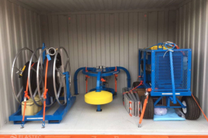 SeaSkater power unit with hoses in container