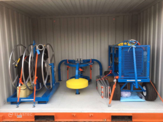 SeaSkater power unit with hoses in container