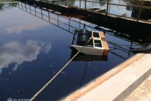 Skim oil from water