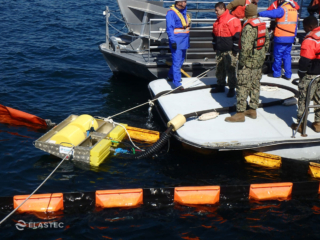 Skimming jet fuel from water