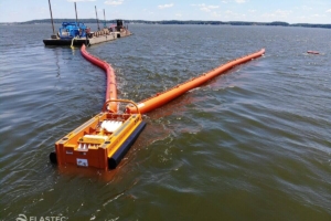 X150 skimmer towed by barge