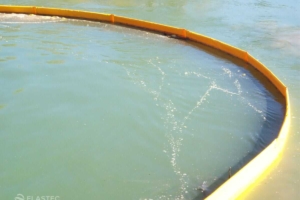 Economax trash and debris boom in water