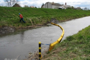 Optimax containment boom in a ditch