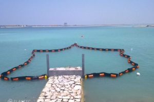 PermaFence containment boom on dock controlling marine life