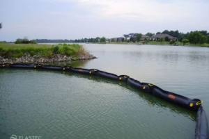 Rubbermax oil containment boom in river