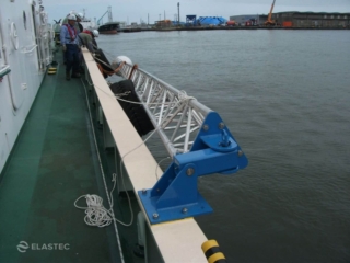 Rubbermax V-Sweep arm stowed on a ship