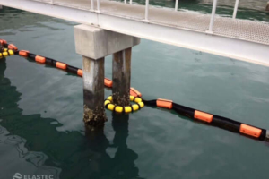 Tether system with PermaFence floating barrier