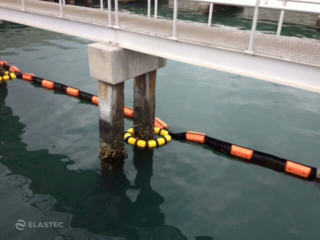 Tether system with PermaFence floating barrier