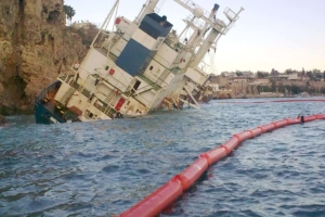 Inflatable boom with ship oil spill