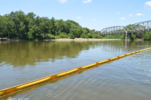 Optimax boom in the Wabash River