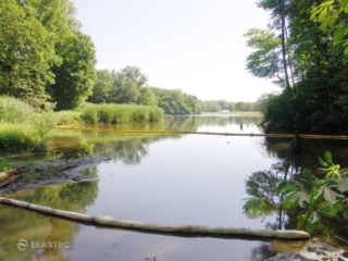 Simplex oil spill boom in creek
