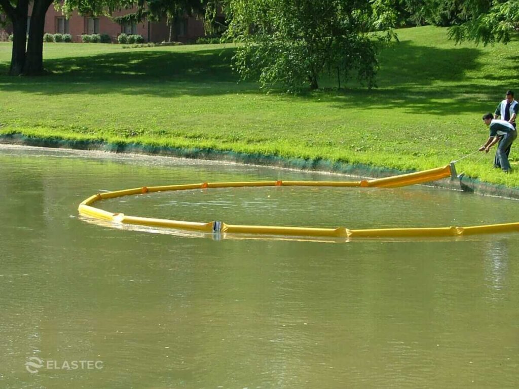 SuperSwamp containment boom in pond