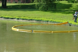 SuperSwamp containment boom in pond