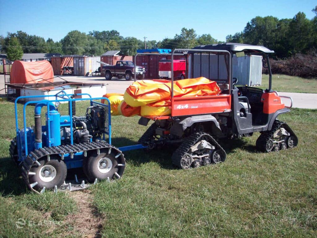 Tundraguard oil boom on specialized vehicle