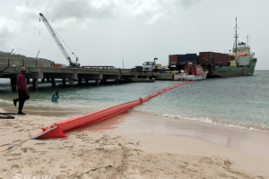 Inflatable oil spill containment boom