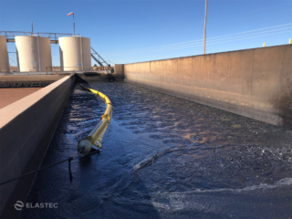 Simplex oil booms in tank battery