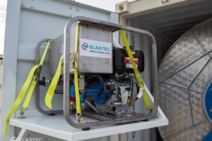 Boom reel in container power unit