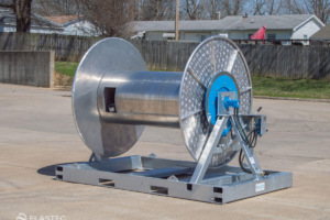 Boom reel with integrated hose