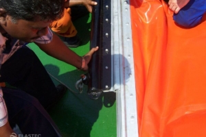 Connecting boom to tow bridle assembly