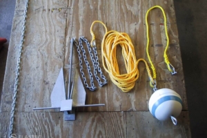 Containment boom anchor system