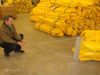 Containment boom with tow bridle