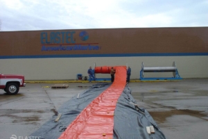 Inflatable boom on reel