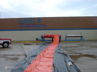 Inflatable boom on reel