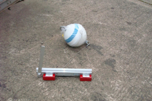 Magnetic boom connector with buoy