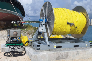 Oil containment boom deployment reel