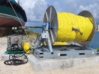 Oil containment boom deployment reel