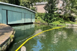Bottle Boom debris barrier at boat dock