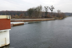 Floating trash and debris boom at dam water intake