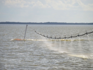 BoomVane dispersant spray system