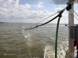 BoomVane spray spraying oil dispersant