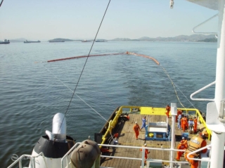 Dispersant application system with boat