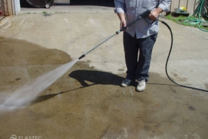 Pressure washer nozzle in driveway