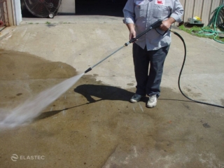 Pressure washer nozzle in driveway