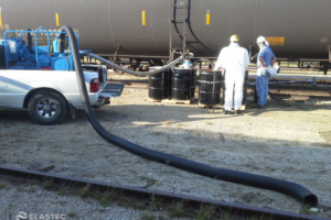 MiniVac vacuum system with oil tank cars