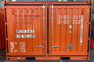 Oil spill response container with doors closed