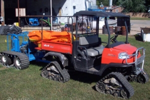 ATV polivalente con brazo de contención y sistema de aspiración